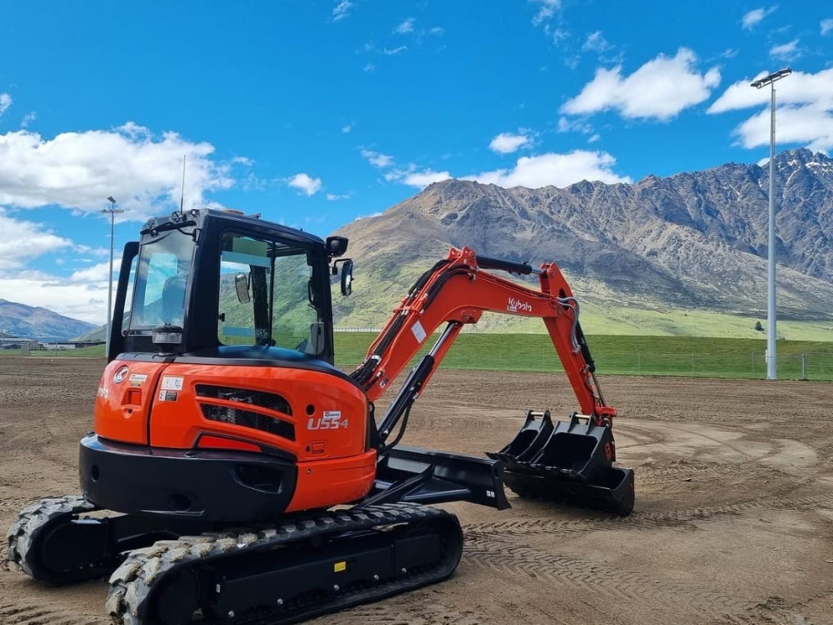 Kubota U55-4 5.5 tonne excavator with angle blade on a prepared site